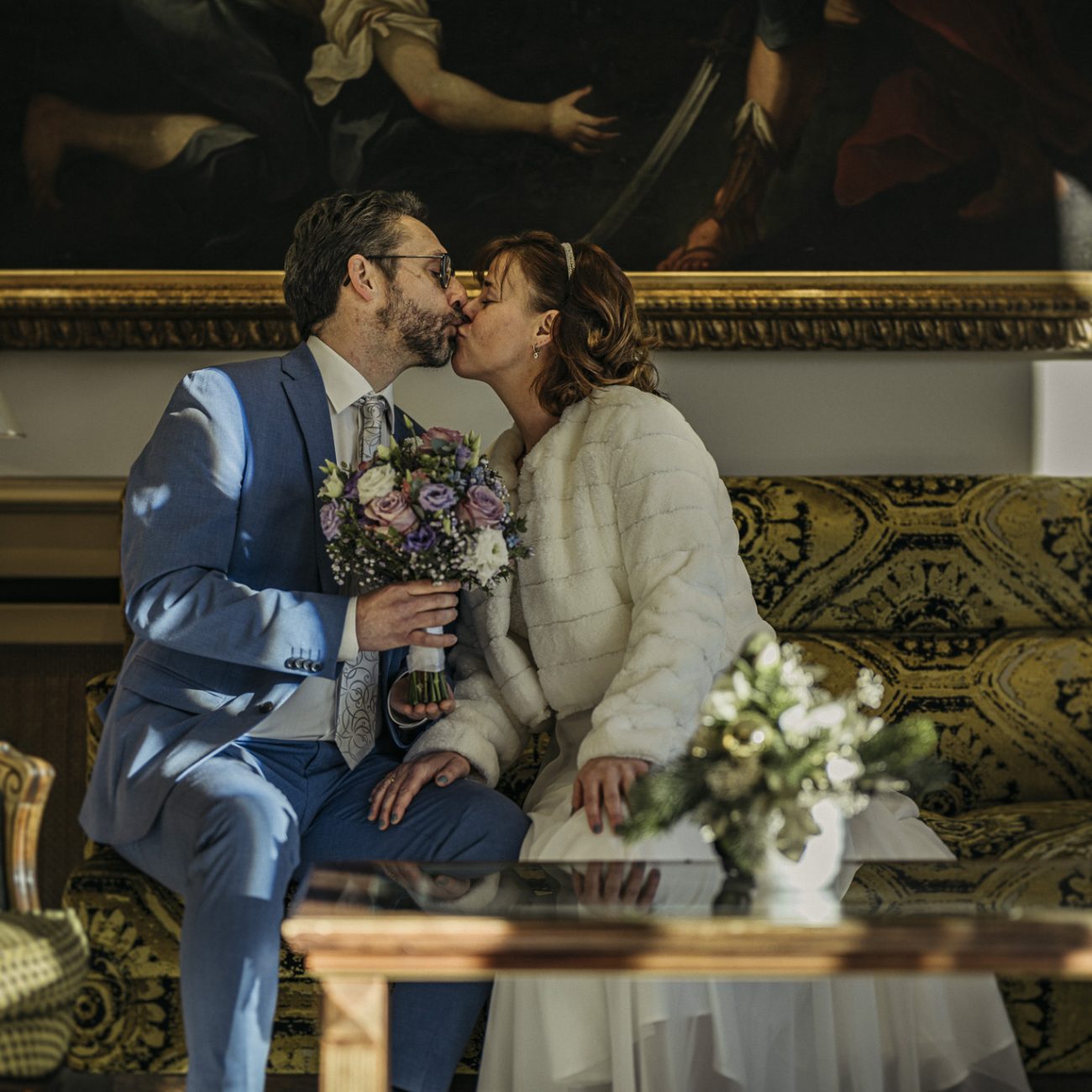 Marian und Tanja bei ihrer Winterhochzeit im Schloss Mirabell Salzburg, emotionale Trauung im Marmorsaal und romantische Momente im verschneiten Mirabellgarten.